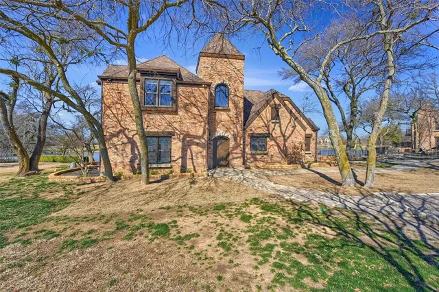 a view of swimming pool with outdoor seating and lake view