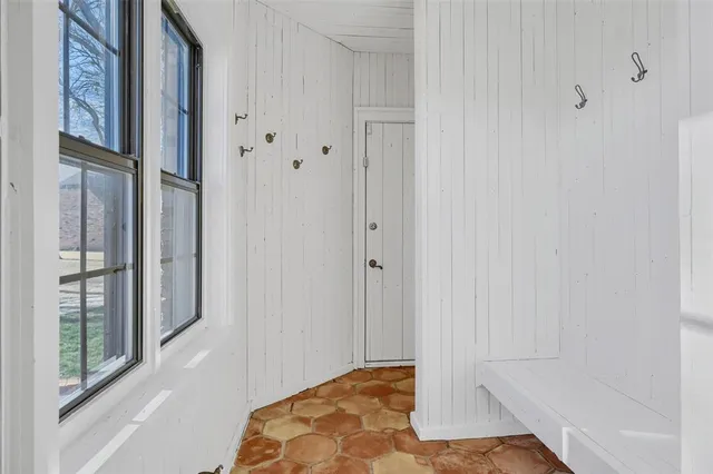 a view of balcony with wooden floor