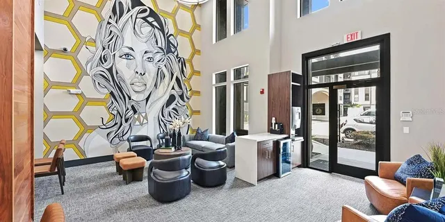 a view of a dinning table and chairs in the patio