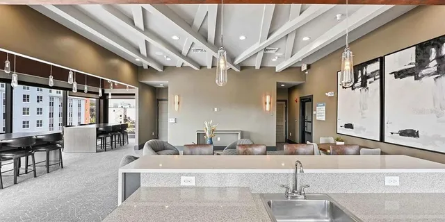 a view of pool with outdoor seating