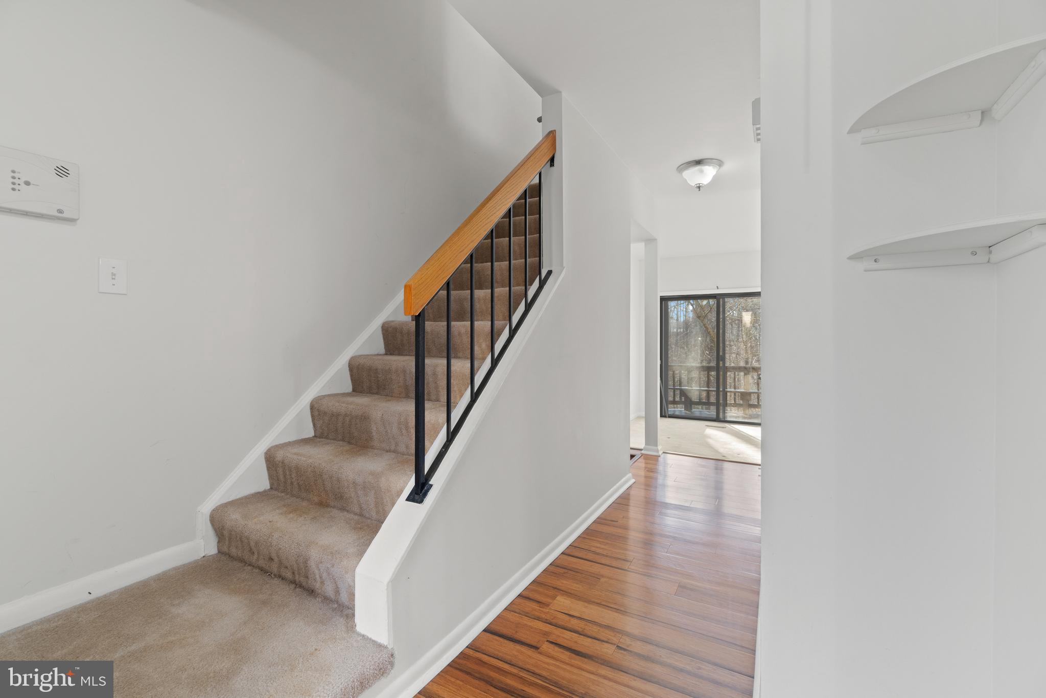 11924 Barrel Cooper Court Reston, VA 20191 - Photo 16 of 27 Foyer and stairs to upper level.