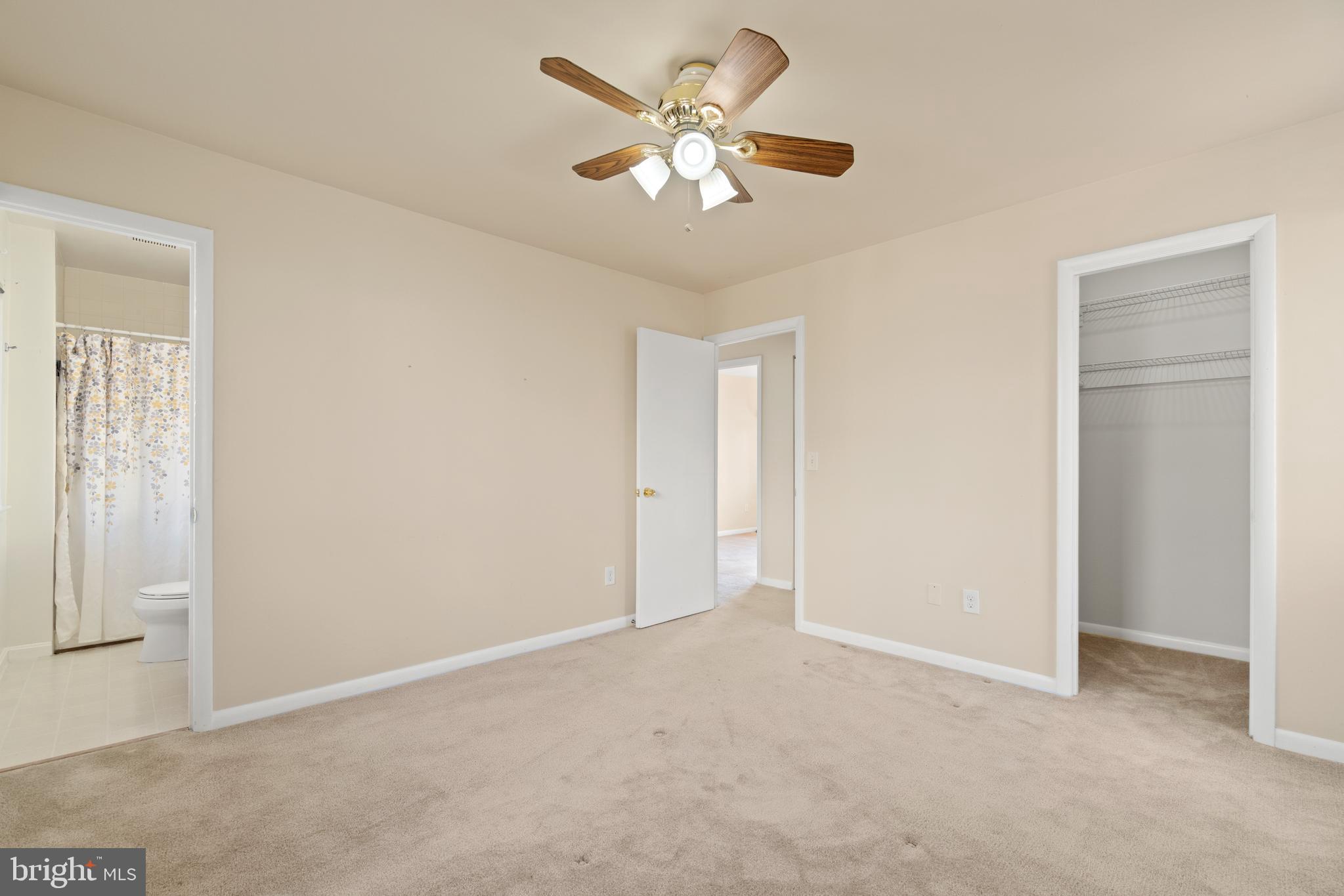 11924 Barrel Cooper Court Reston, VA 20191 - Photo 18 of 27 Primary bedroom and walk-in closet.