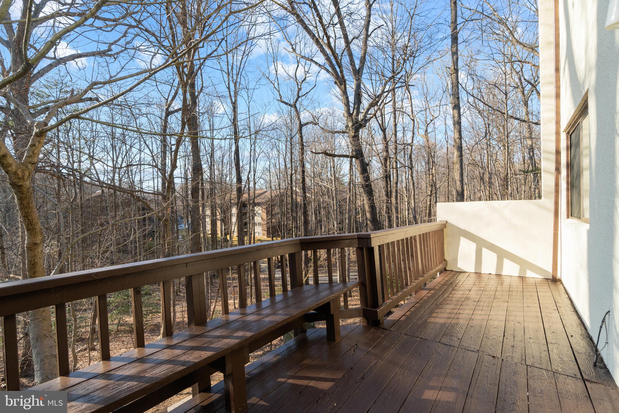 11924 Barrel Cooper Court Reston, VA 20191 - Photo 22 of 27 Repainted/sealed deck with amazing wooded views.