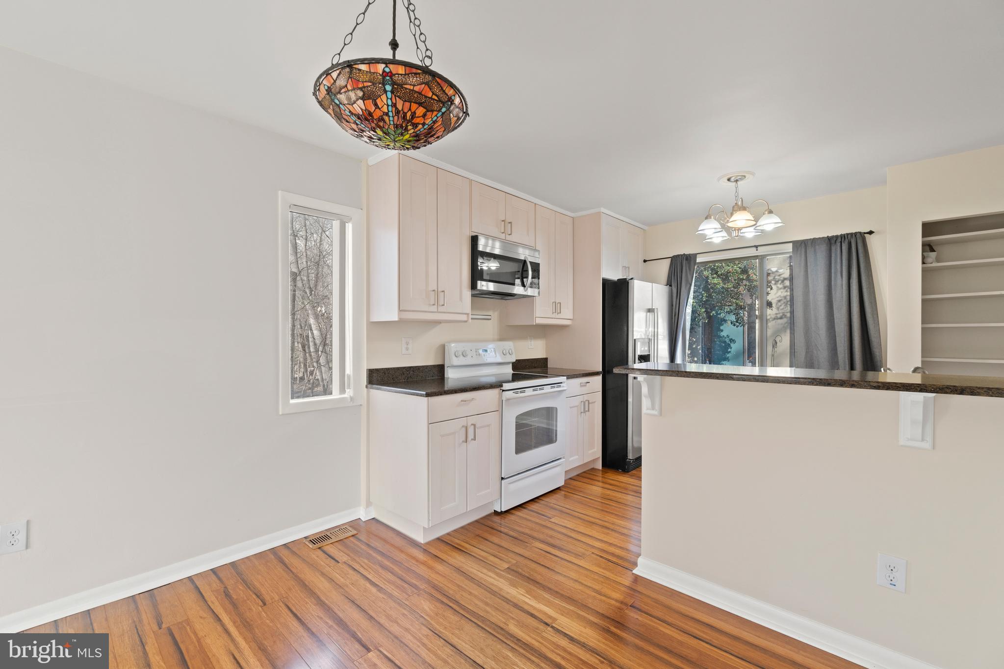 11924 Barrel Cooper Court Reston, VA 20191 - Photo 6 of 27 Open to dining area and family room.