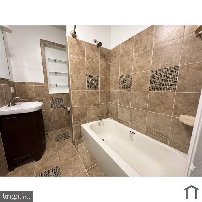 303 Webster Street Northwest Washington, DC 20011 - Photo 14 of 16 Elegant bath with modern tiles.