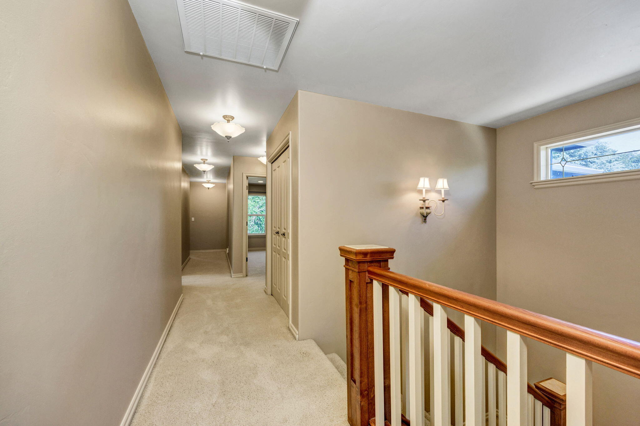 523 Ridgeway Avenue Central Point, OR 97502 - Photo 45 of 68 a view of a hallway with wooden floor