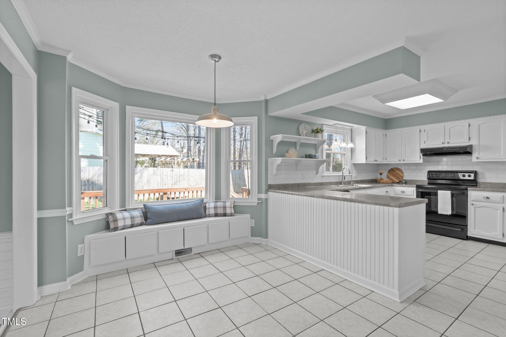 2828 Pidgeon Hill Road Raleigh, NC 27613 - Photo 10 of 38 a kitchen with stainless steel appliances granite countertop a refrigerator and a sink