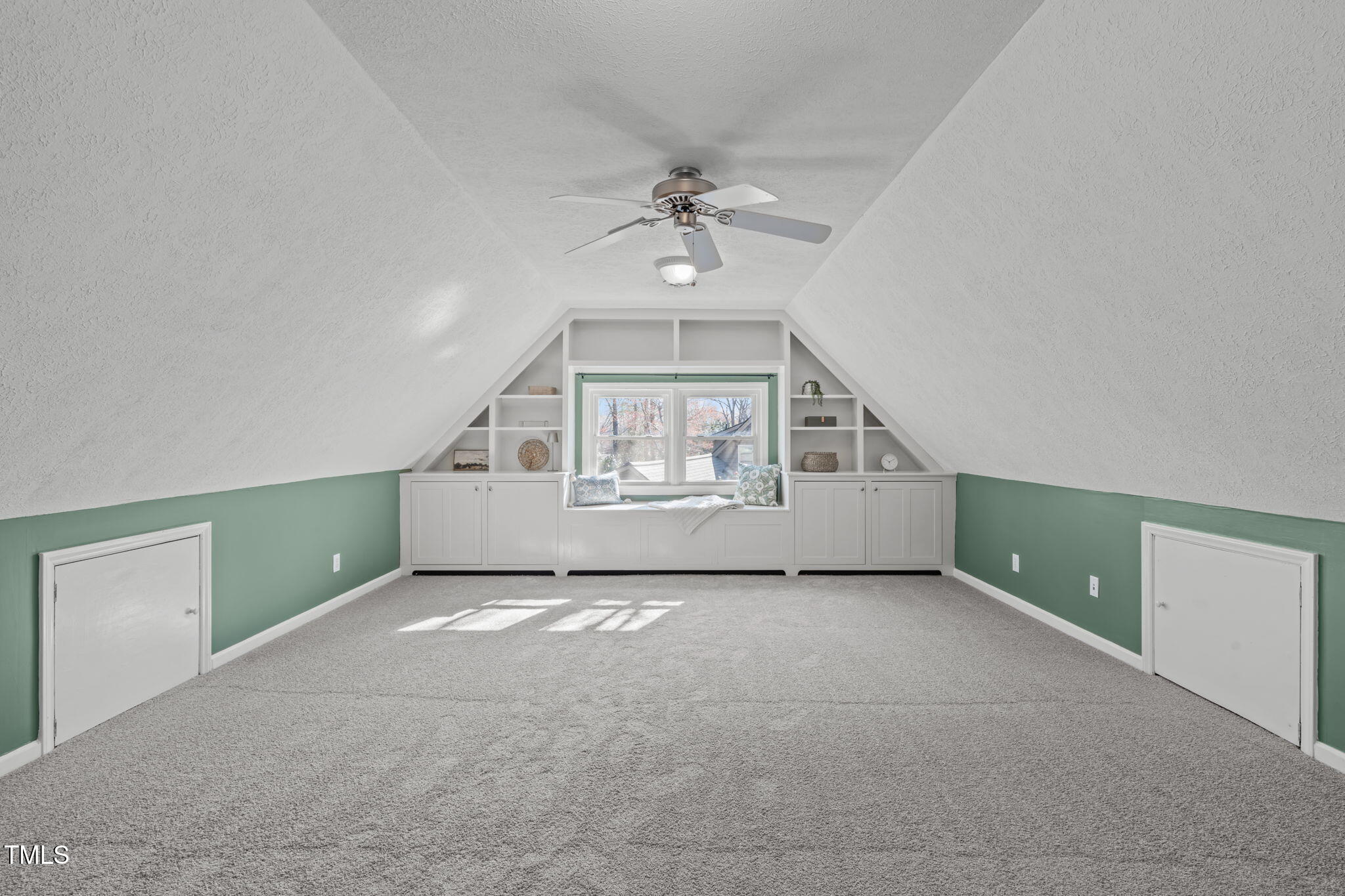 2828 Pidgeon Hill Road Raleigh, NC 27613 - Photo 22 of 38 an empty room with windows and fan