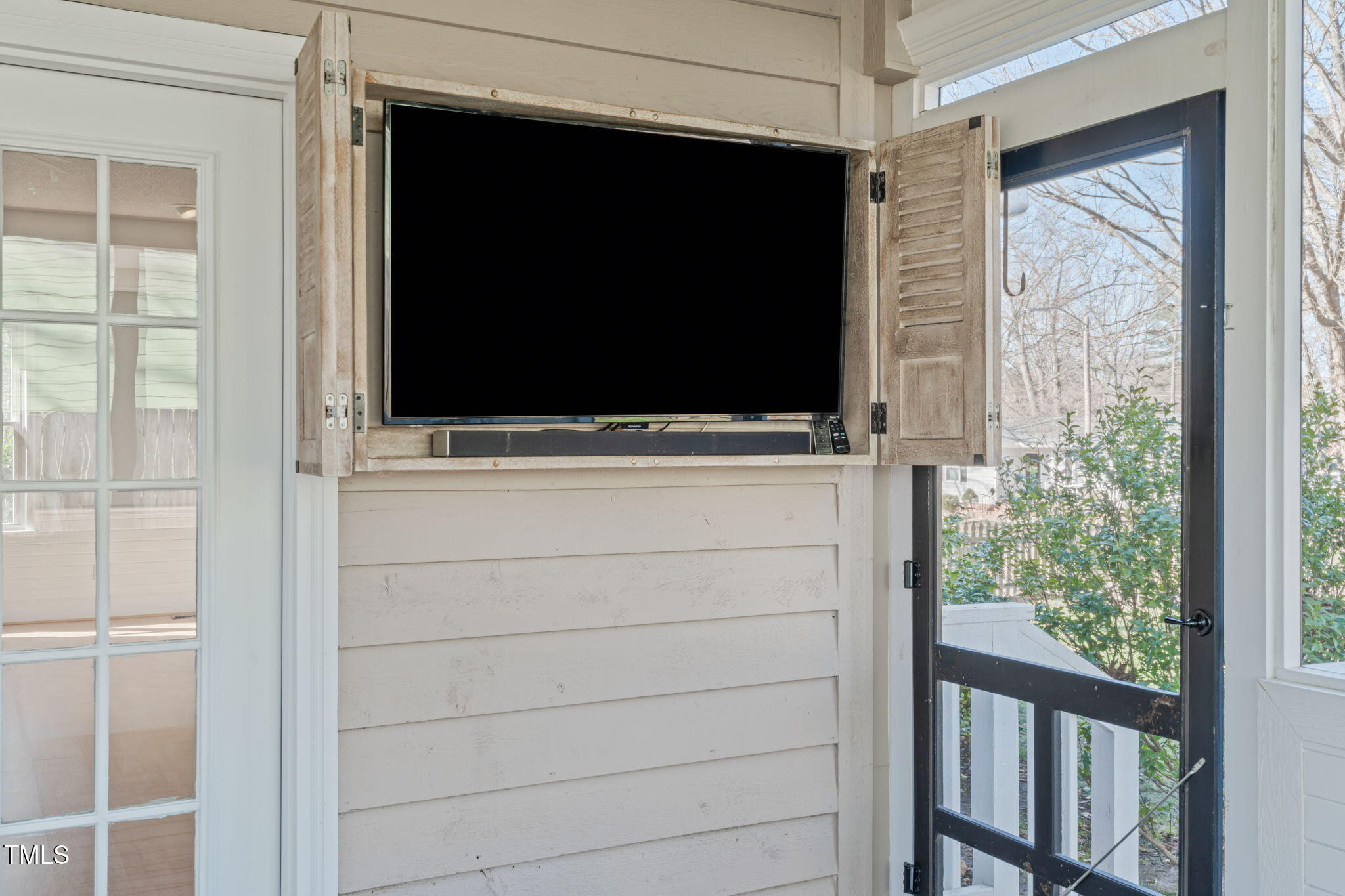 2828 Pidgeon Hill Road Raleigh, NC 27613 - Photo 26 of 38 a view of room with window and flat screen tv