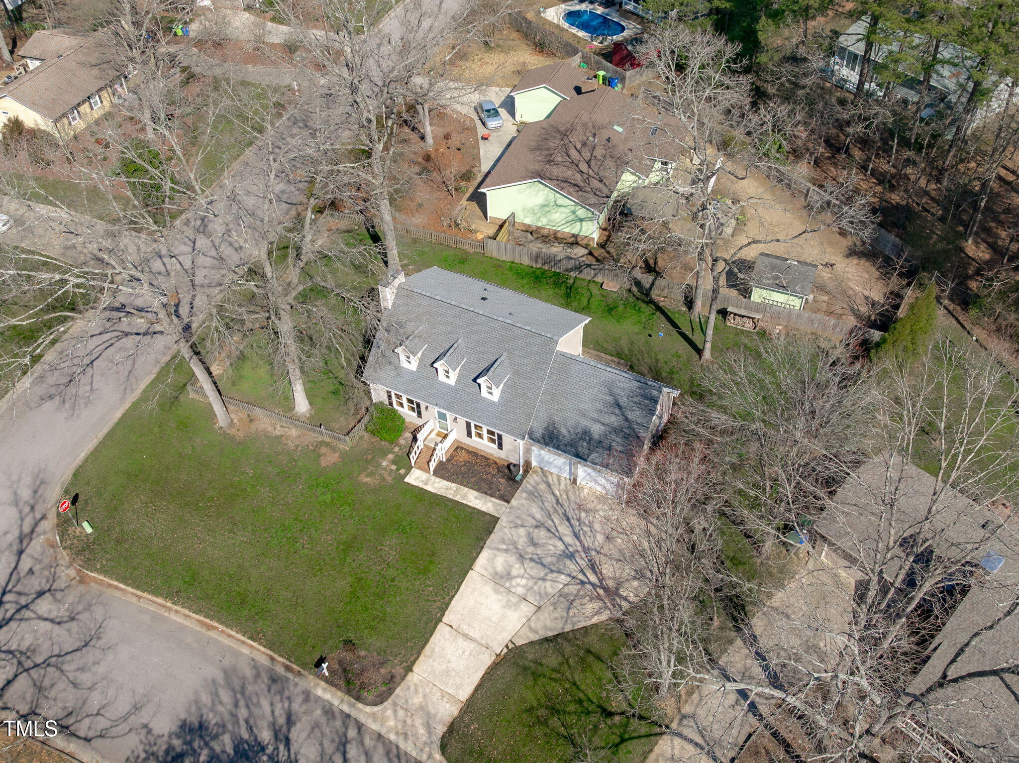 2828 Pidgeon Hill Road Raleigh, NC 27613 - Photo 34 of 38 an aerial view of a house with a yard