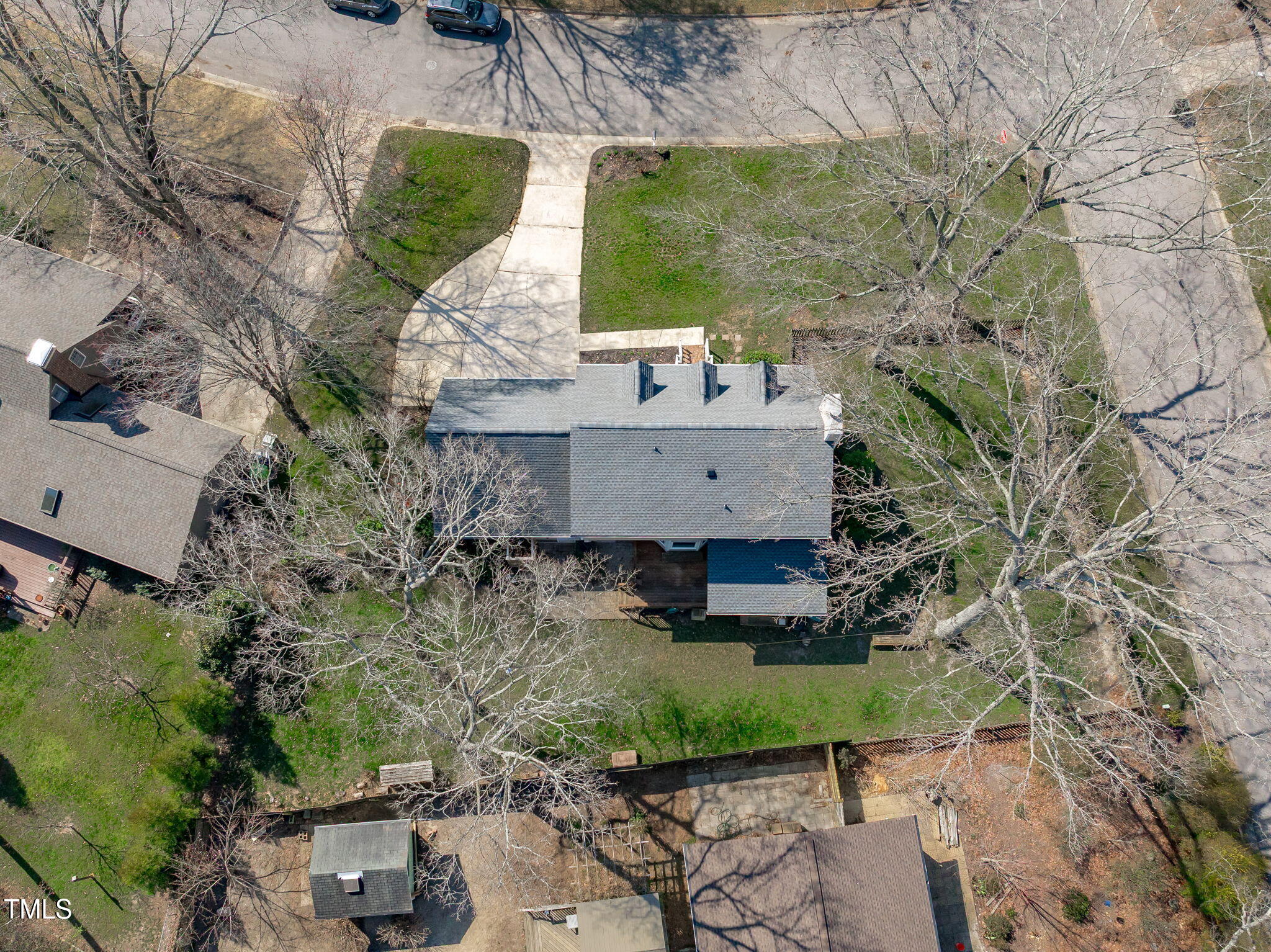 2828 Pidgeon Hill Road Raleigh, NC 27613 - Photo 36 of 38 a view of a house with a yard