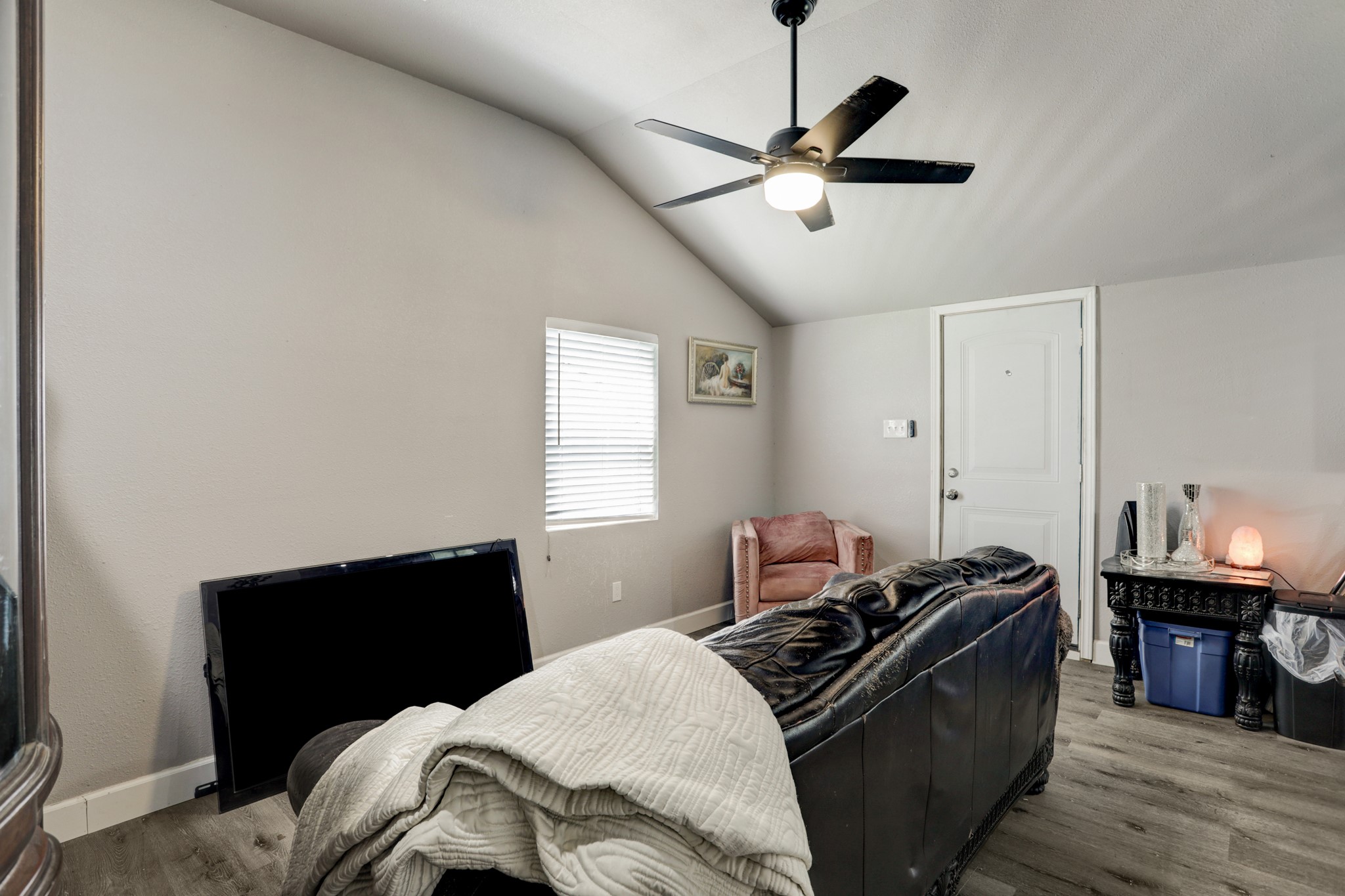 2322 Central Street Dickinson, TX 77539 - Photo 14 of 25 a bedroom with a bed and wooden floor