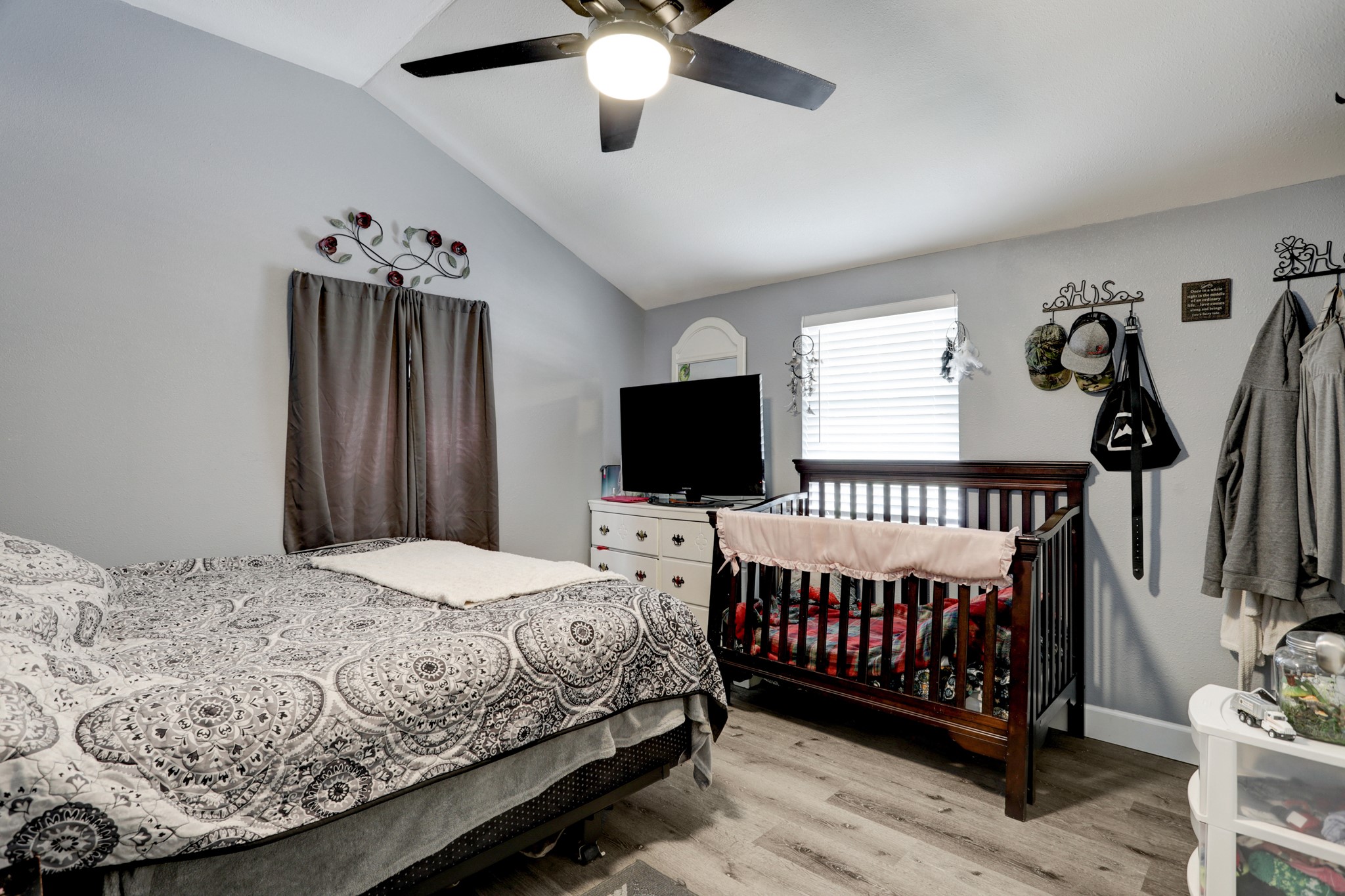 2322 Central Street Dickinson, TX 77539 - Photo 25 of 25 a bedroom with a bed and a flat screen tv