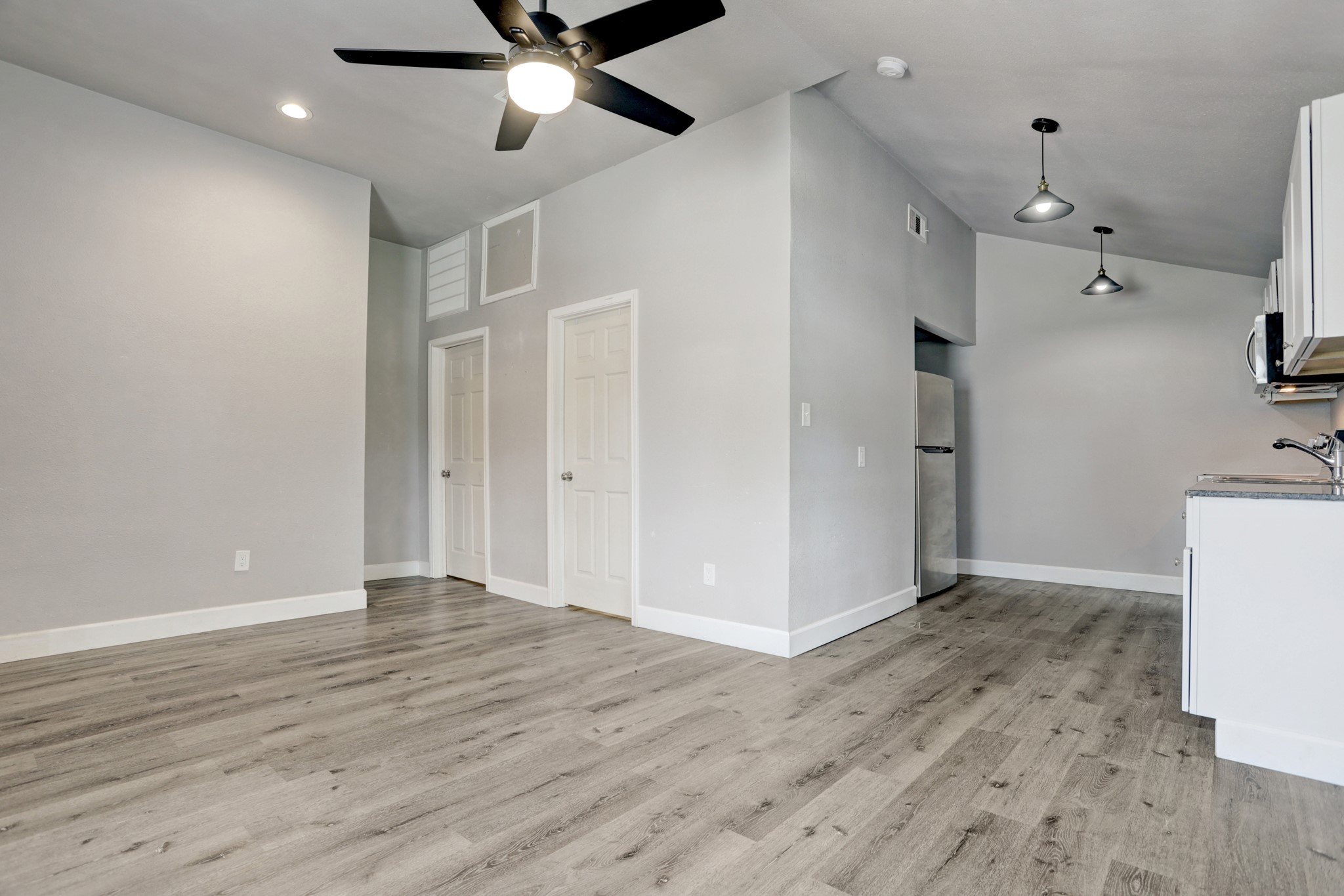 2322 Central Street Dickinson, TX 77539 - Photo 7 of 25 wooden floor in an empty room with a window