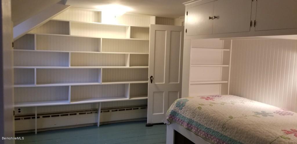 830 E Road Clarksburg, MA 01247 - Photo 9 of 30 a bedroom with a bed and a window