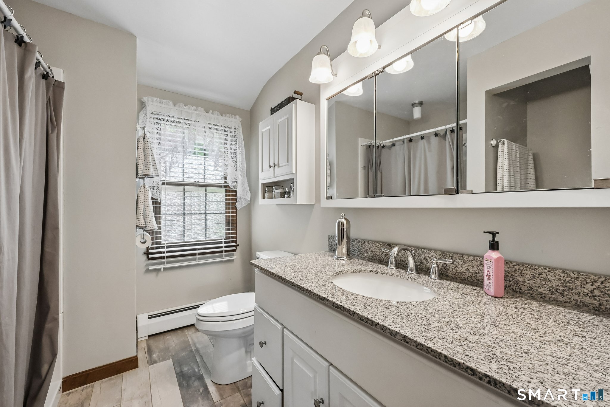 3 East Wharf Road Waterford, CT 06385 - Photo 25 of 40 Granite countertop, walk in shower, and lined closet