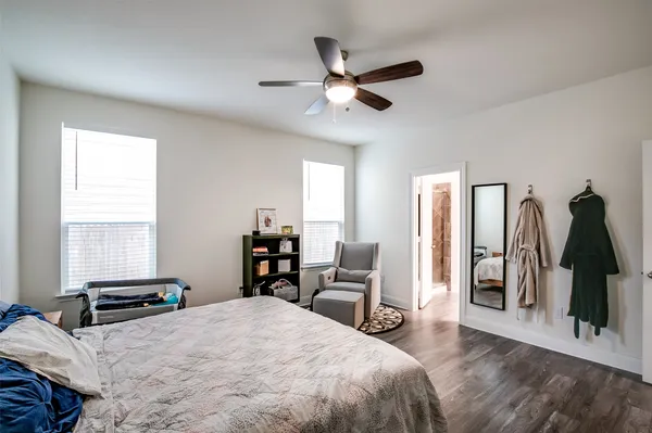 a bed room with a bed and a window
