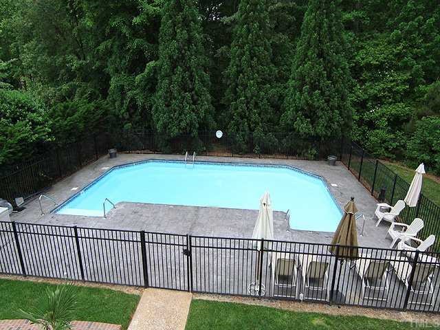 5201 Azure Lane Raleigh, NC 27613 - Photo 11 of 12 Does this look like your own private resort or what? A great place for entertaining for sure! Talk about having fun! What a great place for friends to hang out by pool. The huge backyard gives so much room and privacy. Seller will pay for 1 yr pool care!