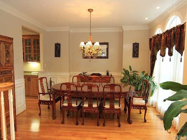 5201 Azure Lane Raleigh, NC 27613 - Photo 3 of 12 A truly elegant Dining room is ready and accommodating for that huge dinner party. Lots of room for that special dining room furniture as well.