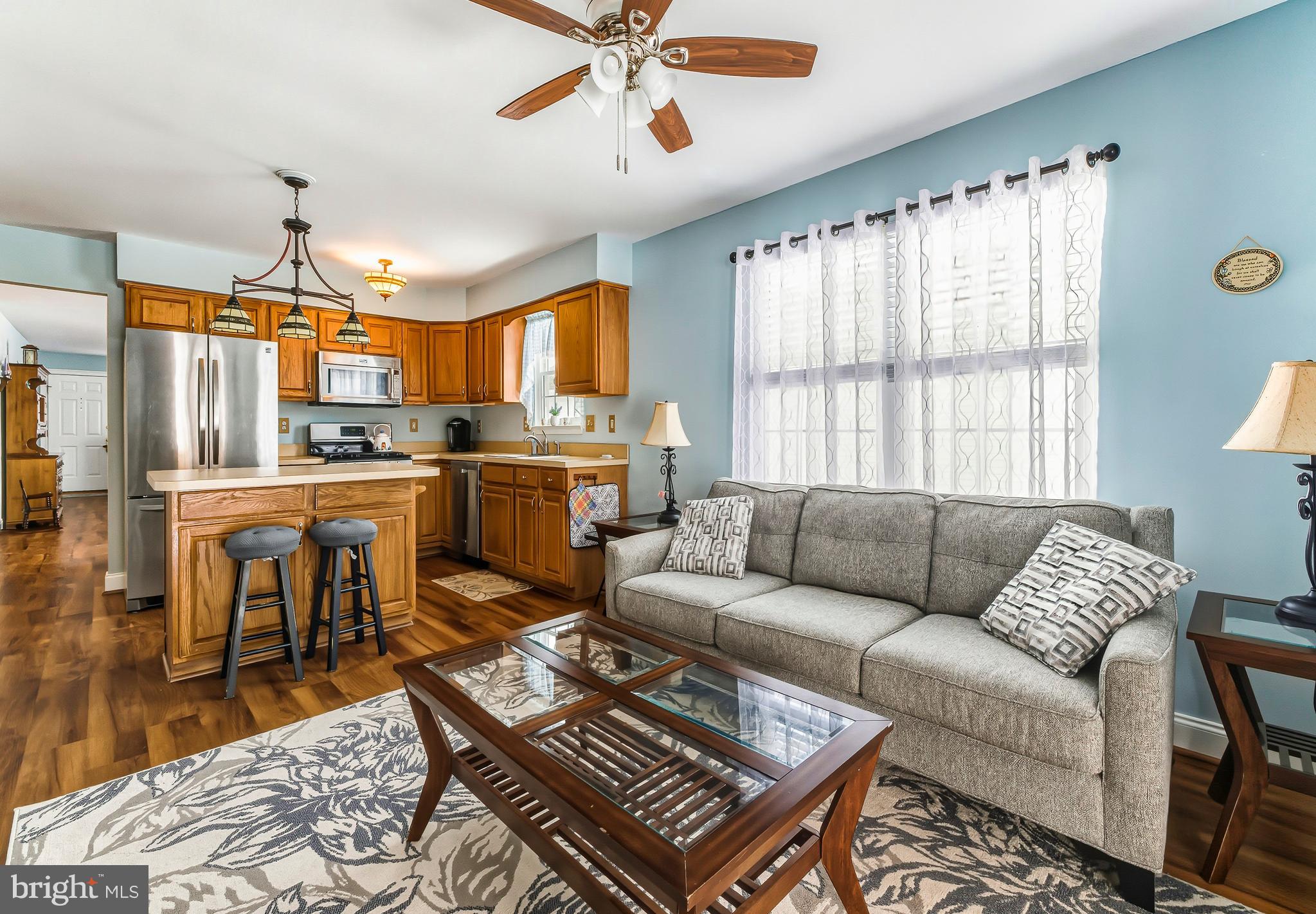 241 Gaunt Drive Mickleton, NJ 08056 - Photo 1 of 32 a living room with stainless steel appliances furniture and a window