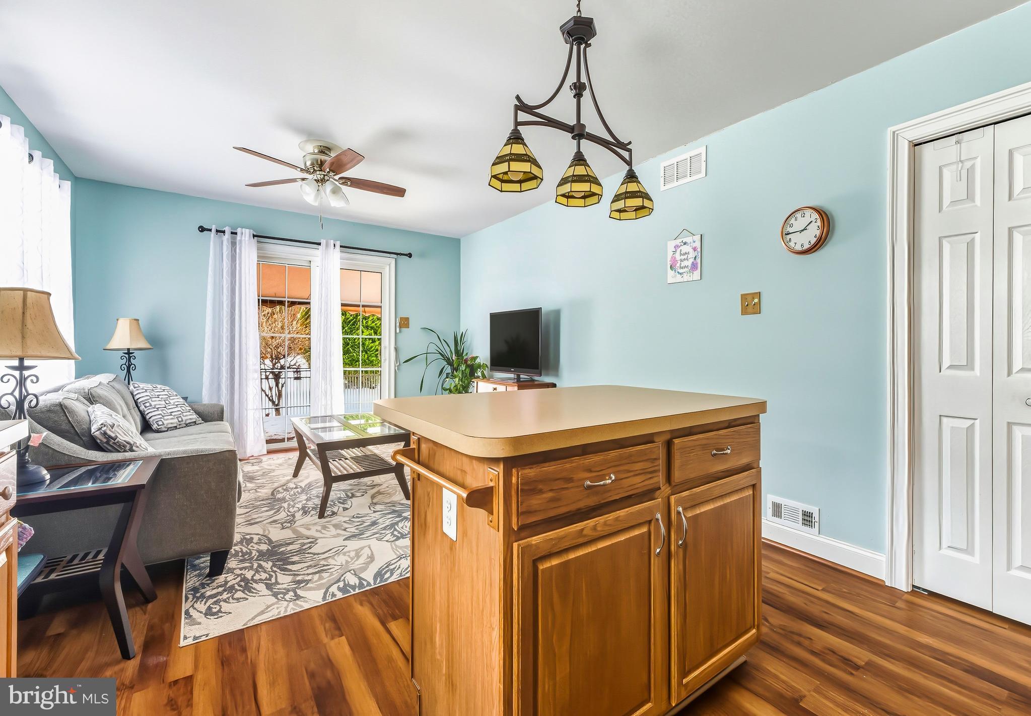 241 Gaunt Drive Mickleton, NJ 08056 - Photo 13 of 32 a living room with a table and chairs