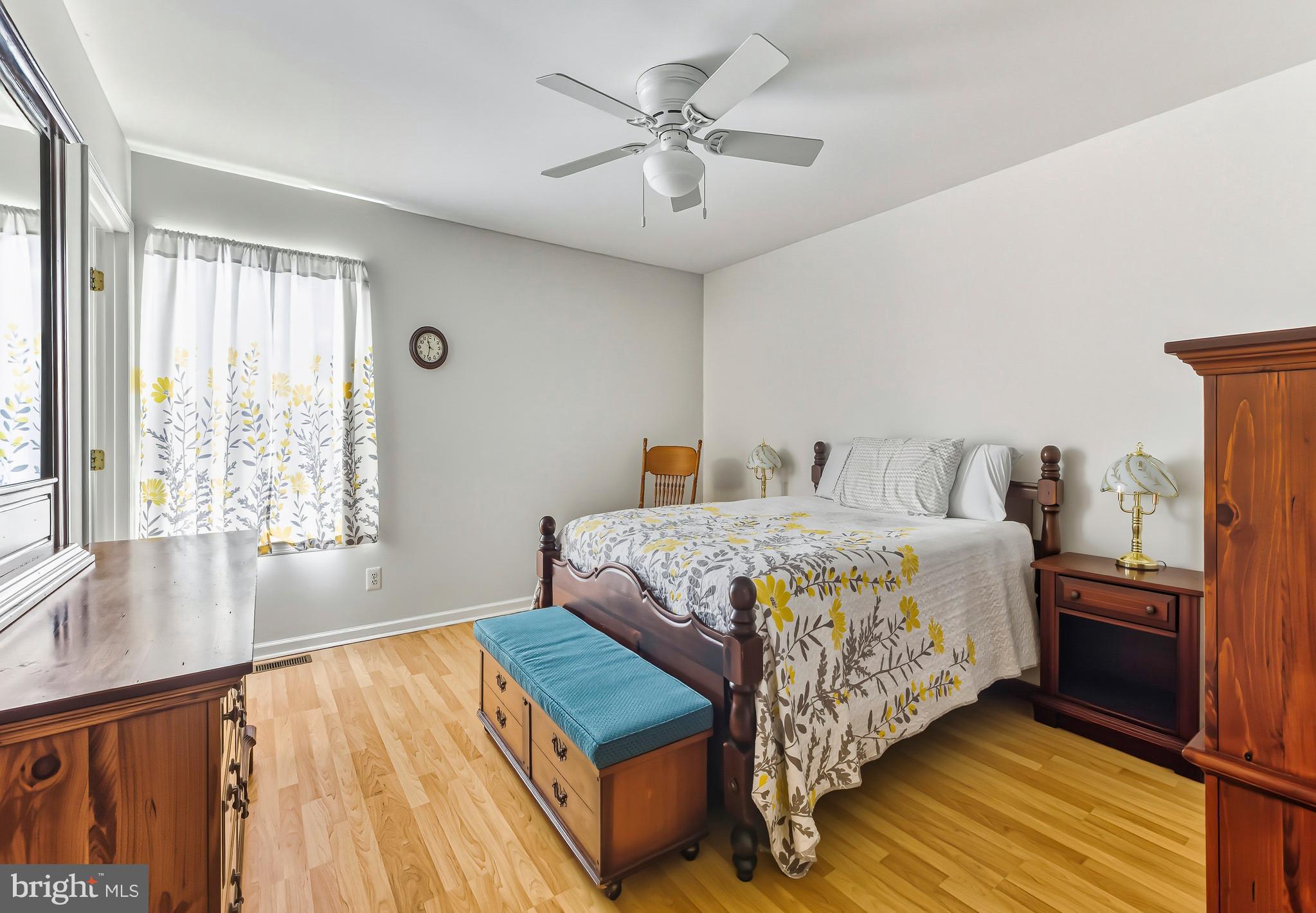 241 Gaunt Drive Mickleton, NJ 08056 - Photo 15 of 32 a bedroom with a bed and wooden floor