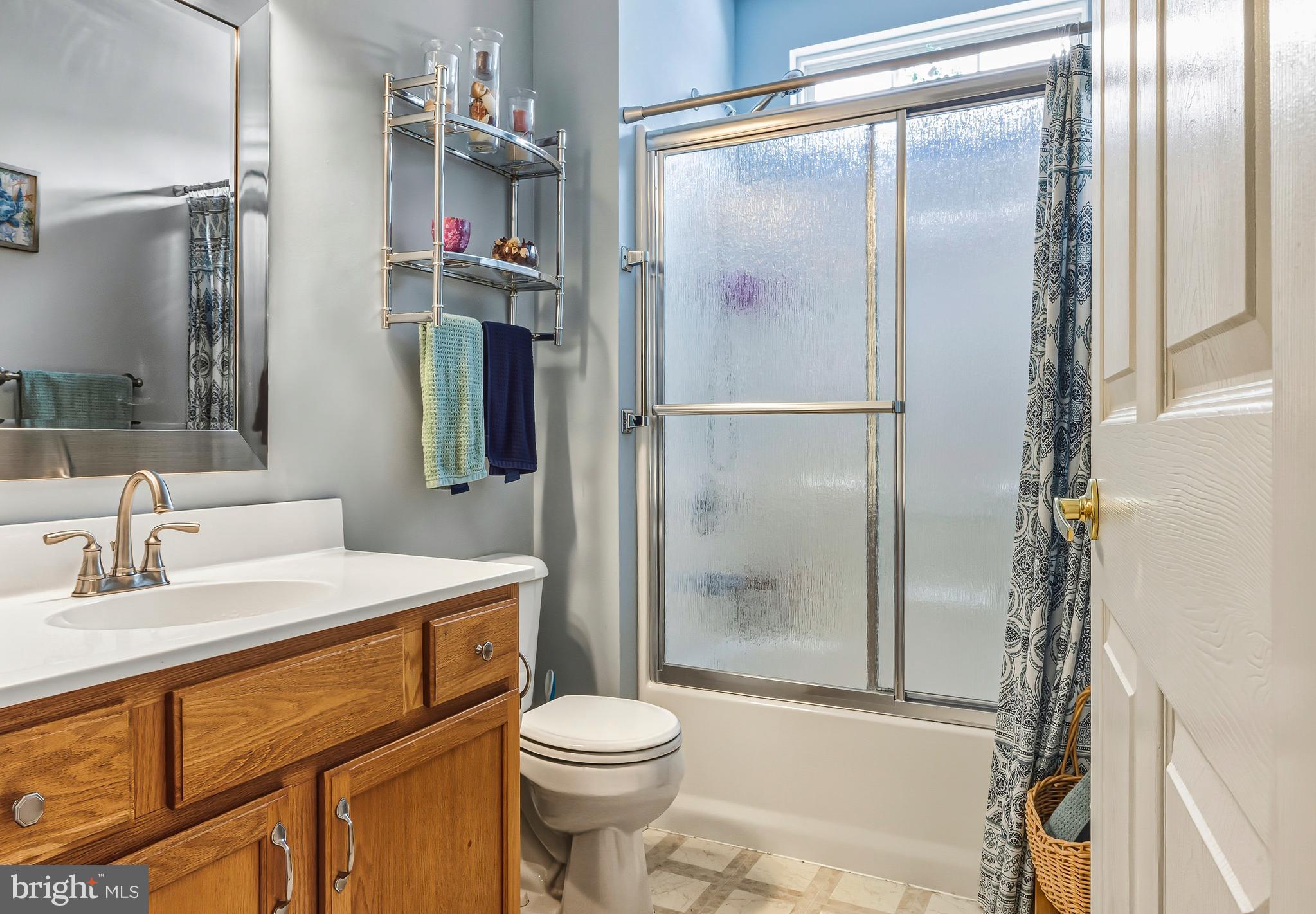 241 Gaunt Drive Mickleton, NJ 08056 - Photo 21 of 32 a bathroom with a sink toilet and shower