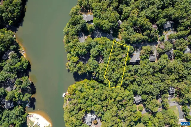 a view of a backyard with sitting area