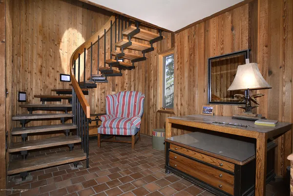 a view of entryway with a front door