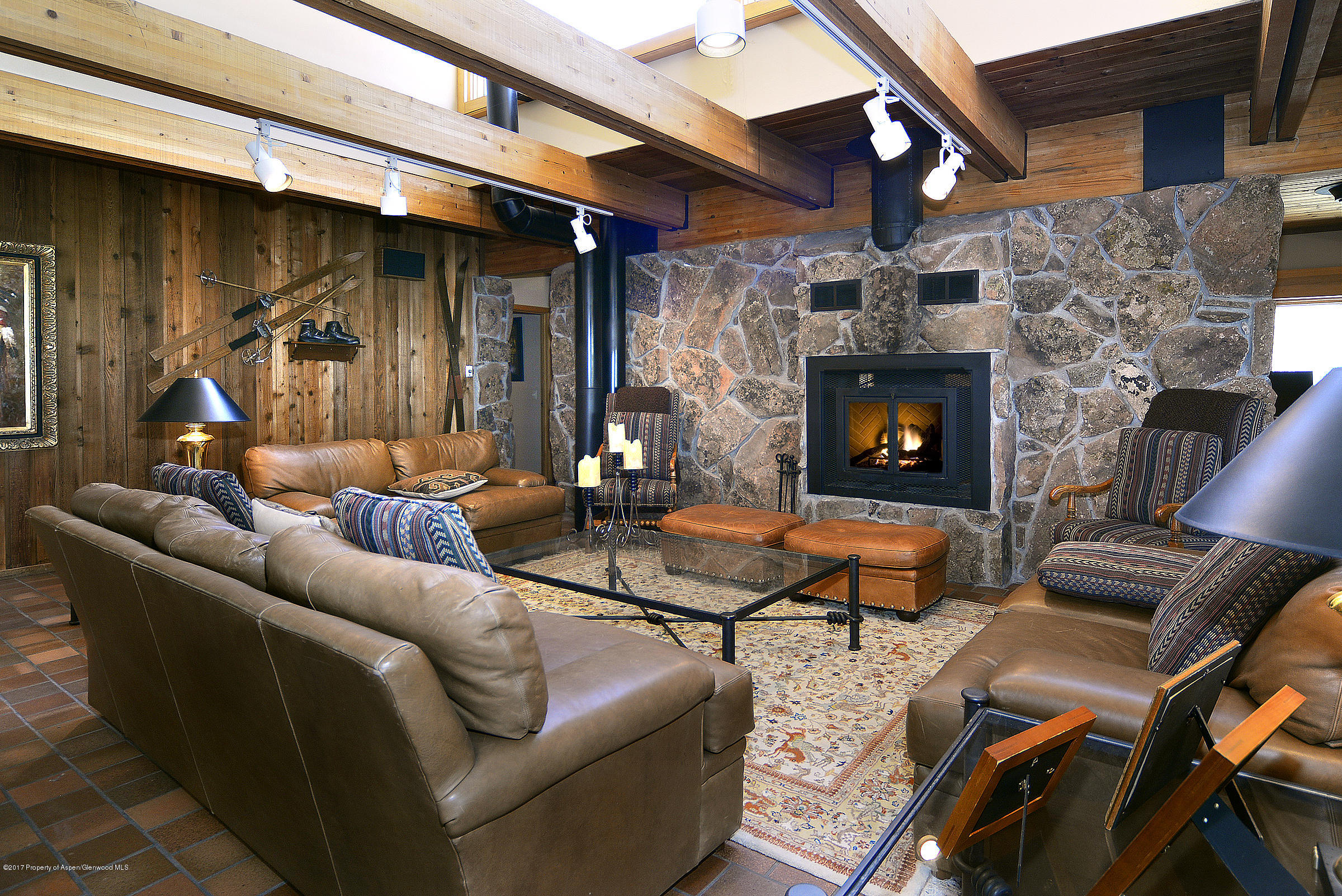 2076 Faraway Road Snowmass Village, CO 81615 - Photo 6 of 21 a outdoor living space with patio furniture and a fireplace