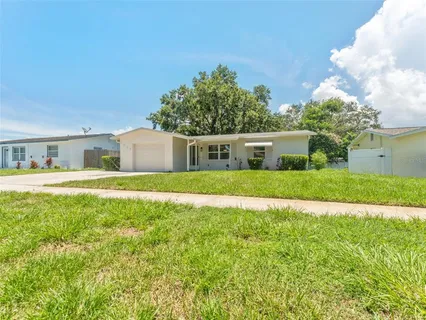 a house with garden in front of it