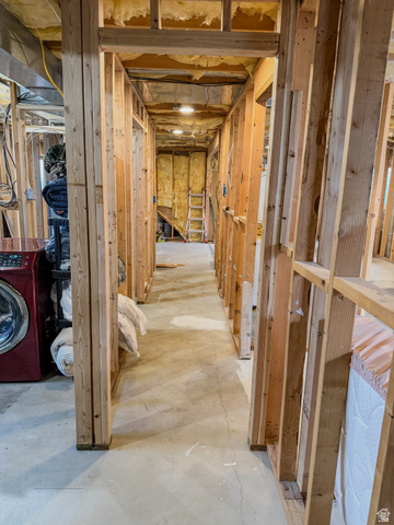 680 Timpie Road Tooele, UT 84074 - Photo 24 of 31 Framed interior space with exposed wooden studs, concrete flooring, and visible insulation