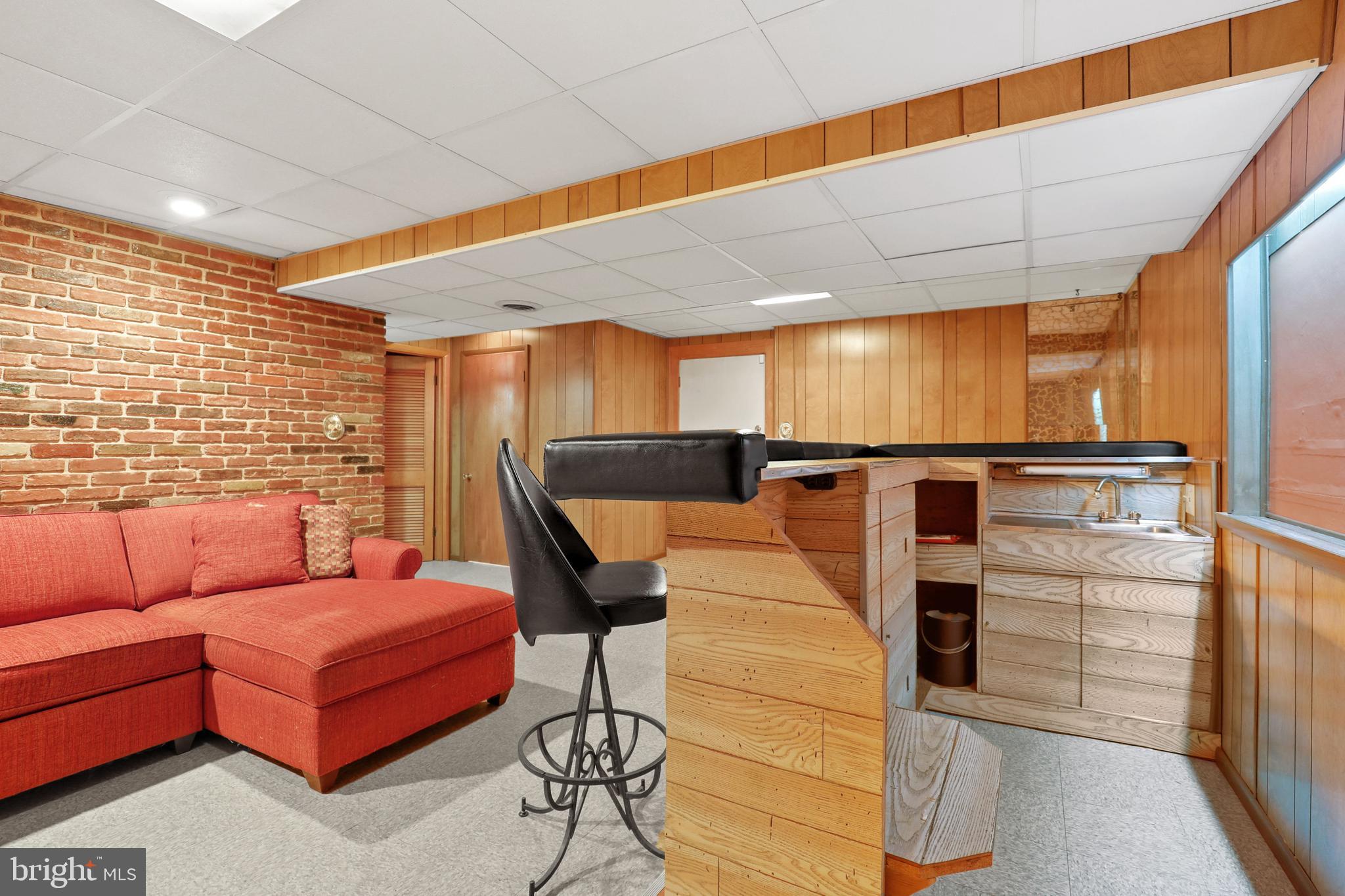 5706 Johnnycake Road Baltimore, MD 21207 - Photo 26 of 32 Brick accent wall.