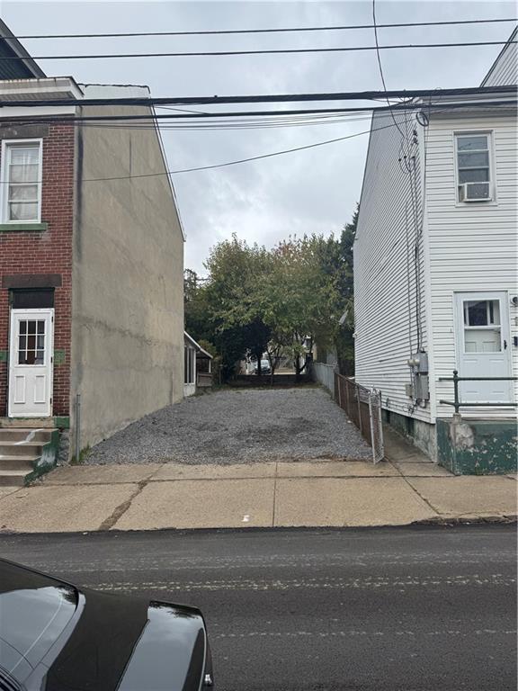 604 Edmond Street Pittsburgh, PA 15224 - Photo 3 of 5 a view of a house with a street