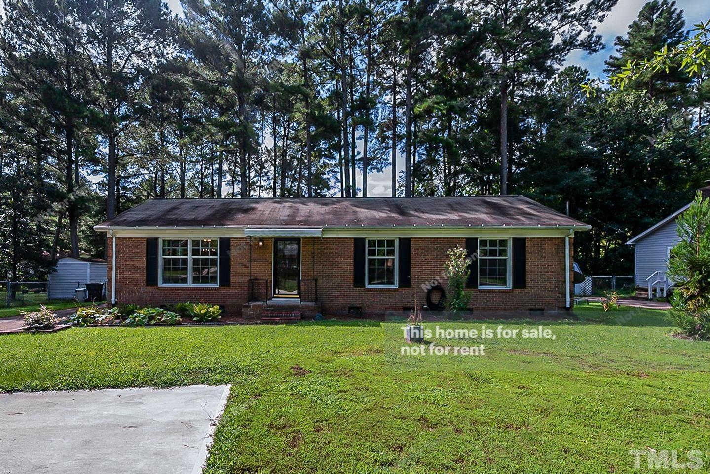 1338 Sedwick Road Durham, NC 27713 - Photo 1 of 20 a front view of house with yard and green space