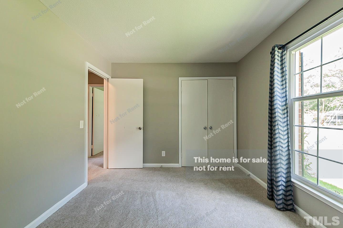 1338 Sedwick Road Durham, NC 27713 - Photo 14 of 20 a view of an empty room with a window