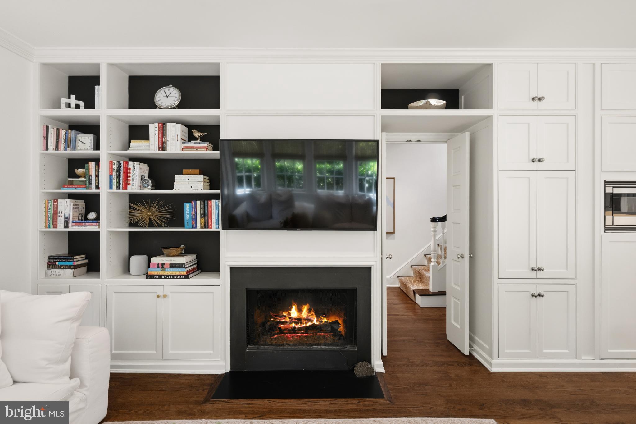 2931 Foxhall Road Northwest Washington, DC 20016 - Photo 22 of 62 a living room with furniture and a fireplace