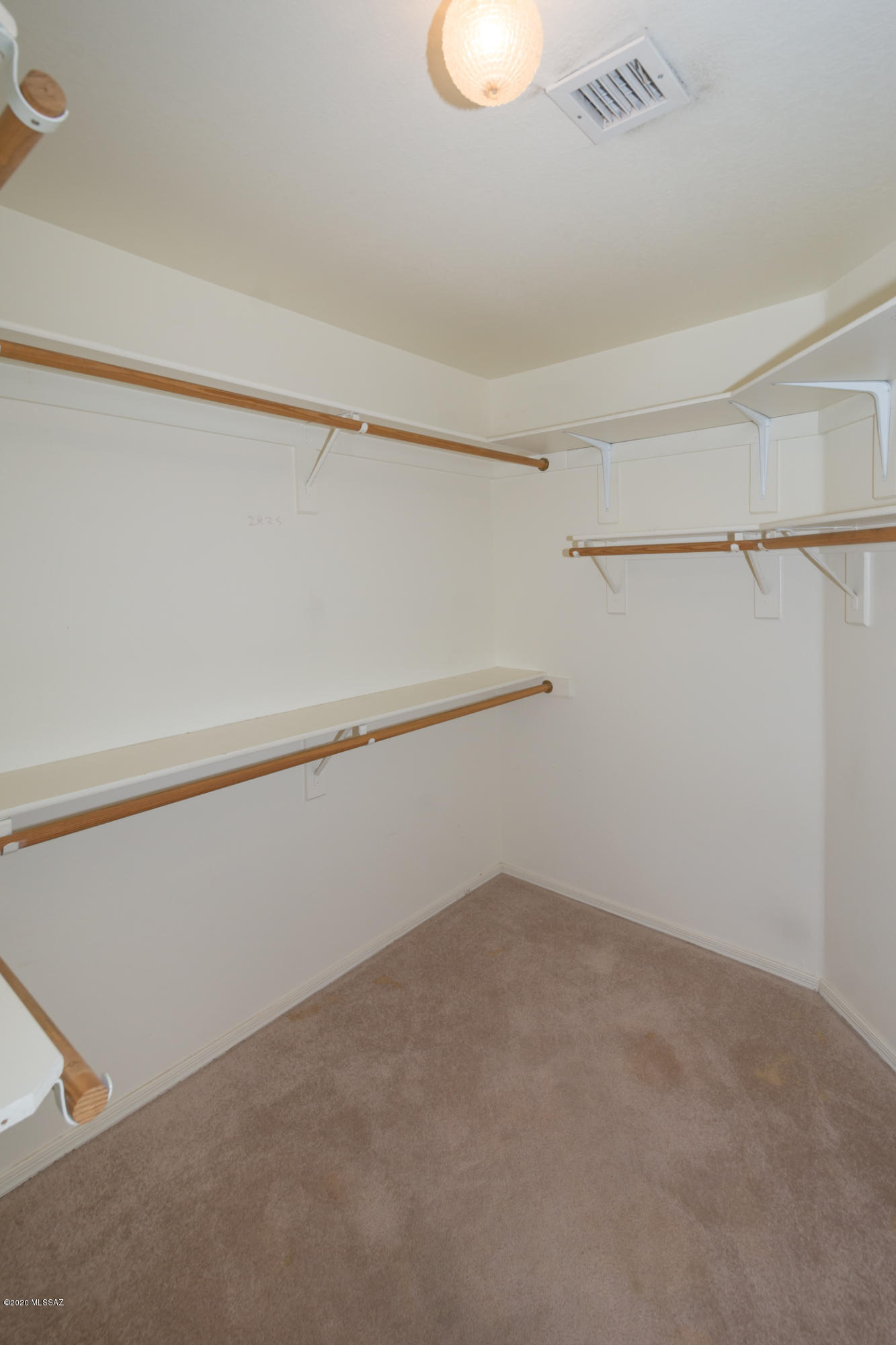 11341 Silver Pheasant Loop Oro Valley, AZ 85737 - Photo 19 of 41 a view of small space with racks on the wall