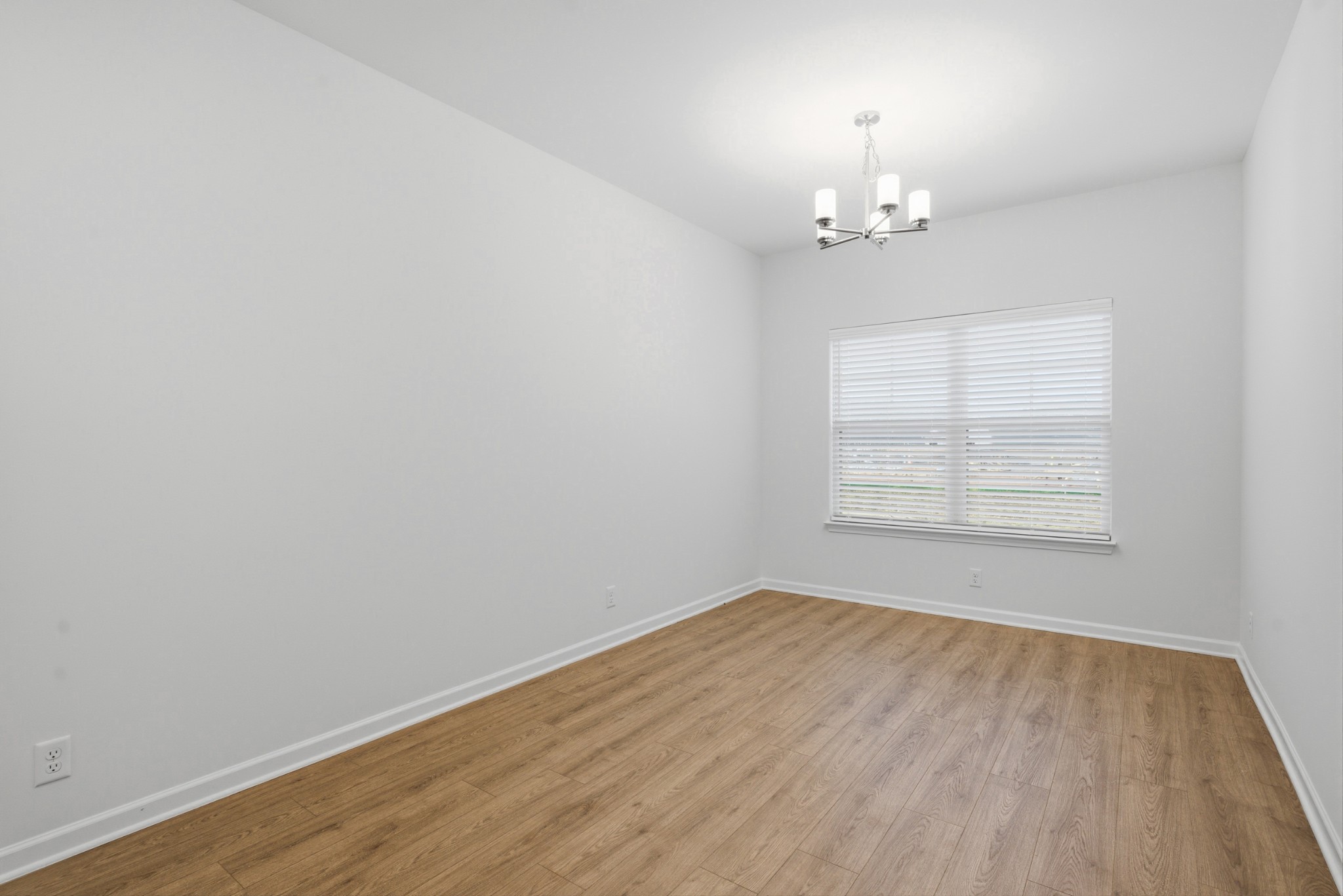 4015 Colleton Lane Murfreesboro, TN 37153 - Photo 7 of 34 wooden floor in an empty room with a window