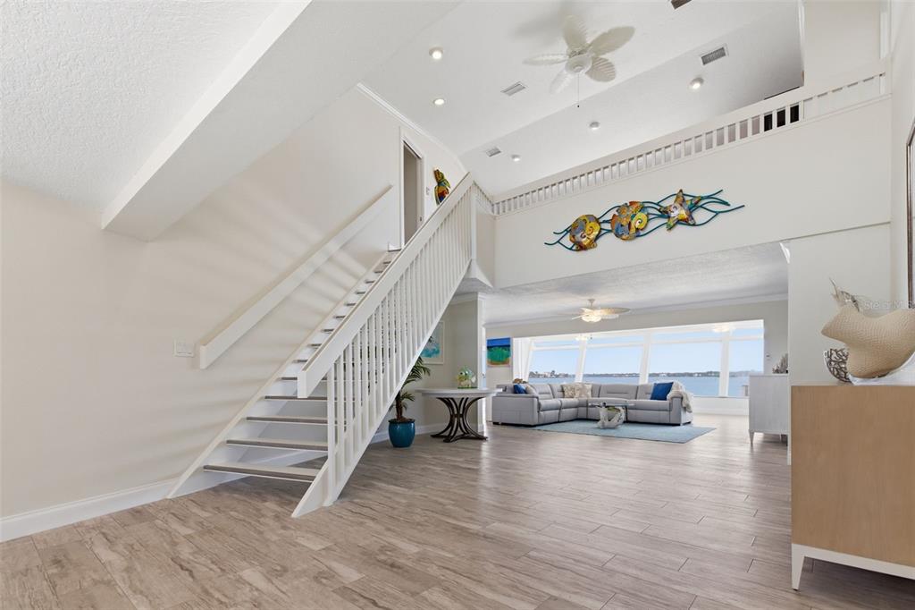 16123 6th Street East Redington Beach, FL 33708 - Photo 24 of 48 a view of livingroom with furniture and staircase