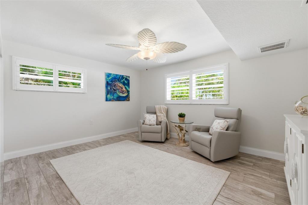 16123 6th Street East Redington Beach, FL 33708 - Photo 26 of 48 a living room with furniture and a window