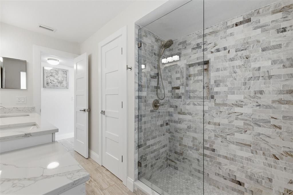 16123 6th Street East Redington Beach, FL 33708 - Photo 30 of 48 a bathroom with a shower