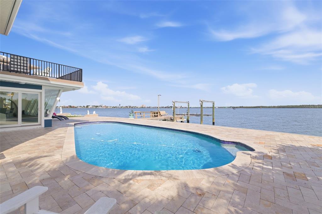 16123 6th Street East Redington Beach, FL 33708 - Photo 34 of 48 a view of a swimming pool and a mountain view