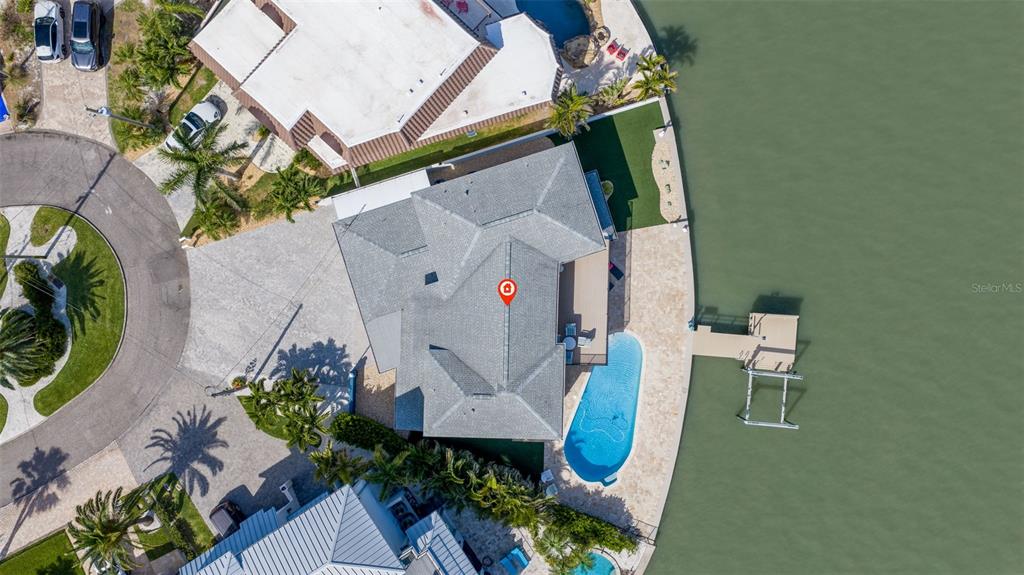 16123 6th Street East Redington Beach, FL 33708 - Photo 40 of 48 an aerial view of a house with outdoor space and sitting area
