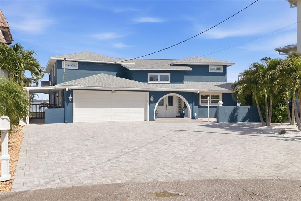 16123 6th Street East Redington Beach, FL 33708 - Photo 46 of 48 a front view of a house with a yard