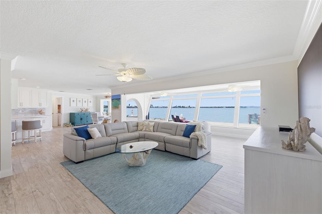 16123 6th Street East Redington Beach, FL 33708 - Photo 5 of 48 a living room with furniture and a couch