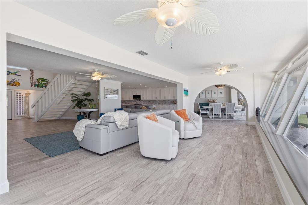 16123 6th Street East Redington Beach, FL 33708 - Photo 8 of 48 a living room with furniture and a wooden floor