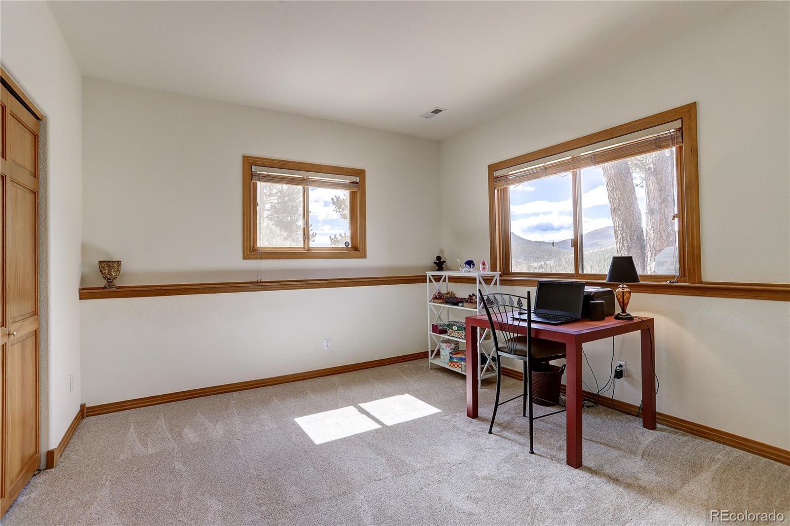 109 Royal Ridge Drive Bailey, CO 80421 - Photo 27 of 39 a workspace with a window