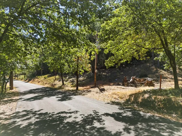 a view of a yard with snow