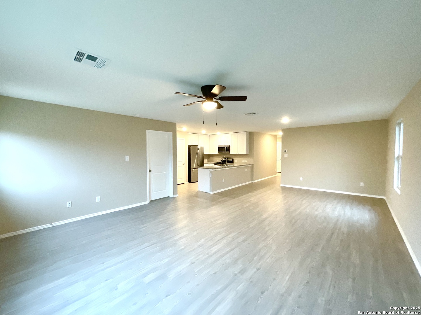 10751 Margarita Loop Converse, TX 78109 - Photo 25 of 40 a view of a livingroom with wooden floor